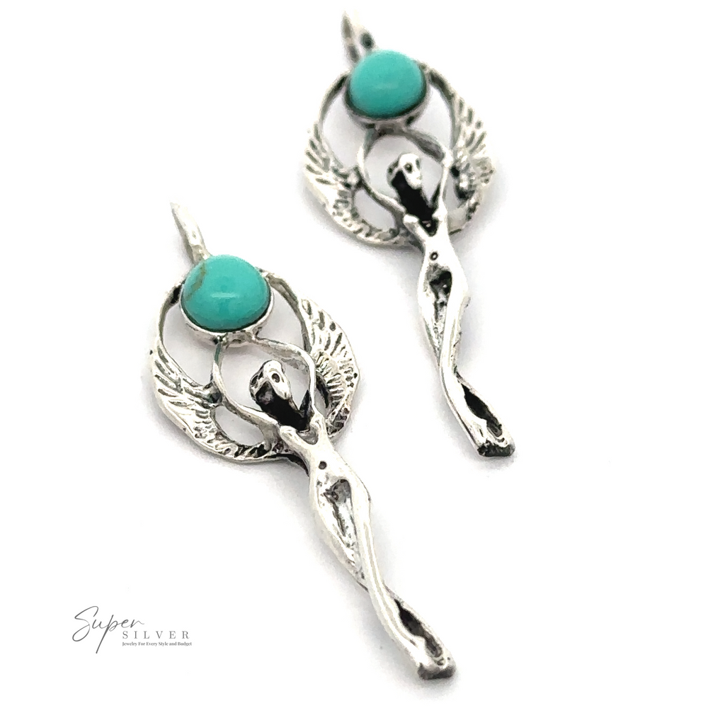 Two silver pendants in the shape of winged maidens each hold a turquoise stone, with wings extending outward. The logo 