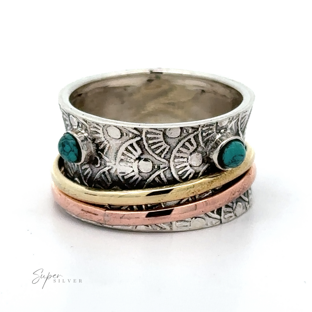 
                  
                    A Handmade Tricolor Spinner Ring with Moonstone Accents with turquoise and moonstone stones.
                  
                