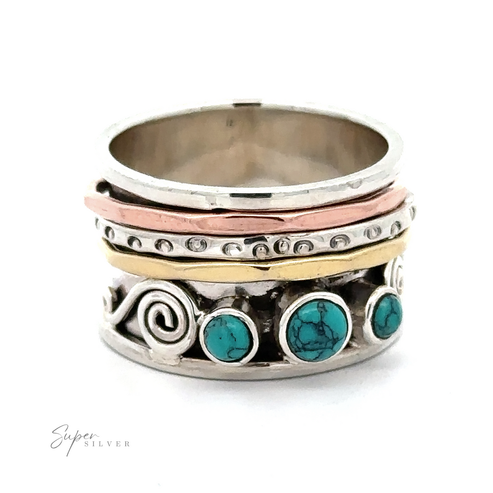 A Turquoise Spinner Band with Swirls ring with turquoise stones and swirls.