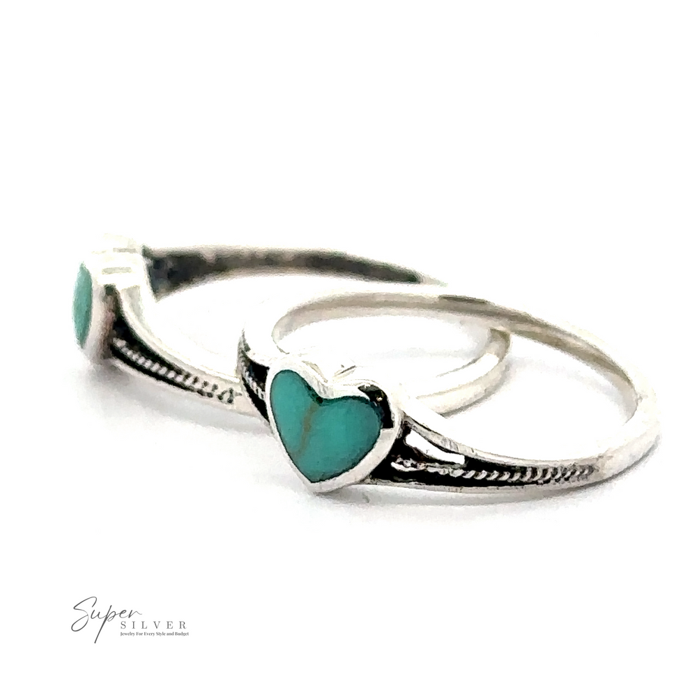 Two sterling silver rings with adorable Small Inlaid Turquoise Heart Rings. The rings boast a detailed design, and the text 