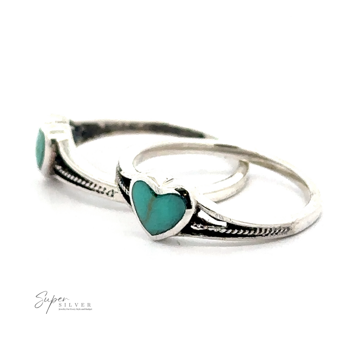 Two sterling silver rings with adorable Small Inlaid Turquoise Heart Rings. The rings boast a detailed design, and the text "Super Silver" is visible in the bottom-left corner. Perfect for lovers of turquoise stone jewelry.