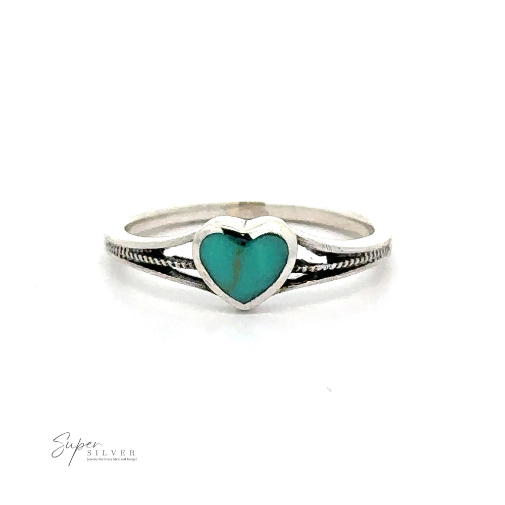 Small Inlaid Turquoise Heart Ring with an adorable heart-shaped turquoise stone at the center. The band features a simple design with a slight twist.