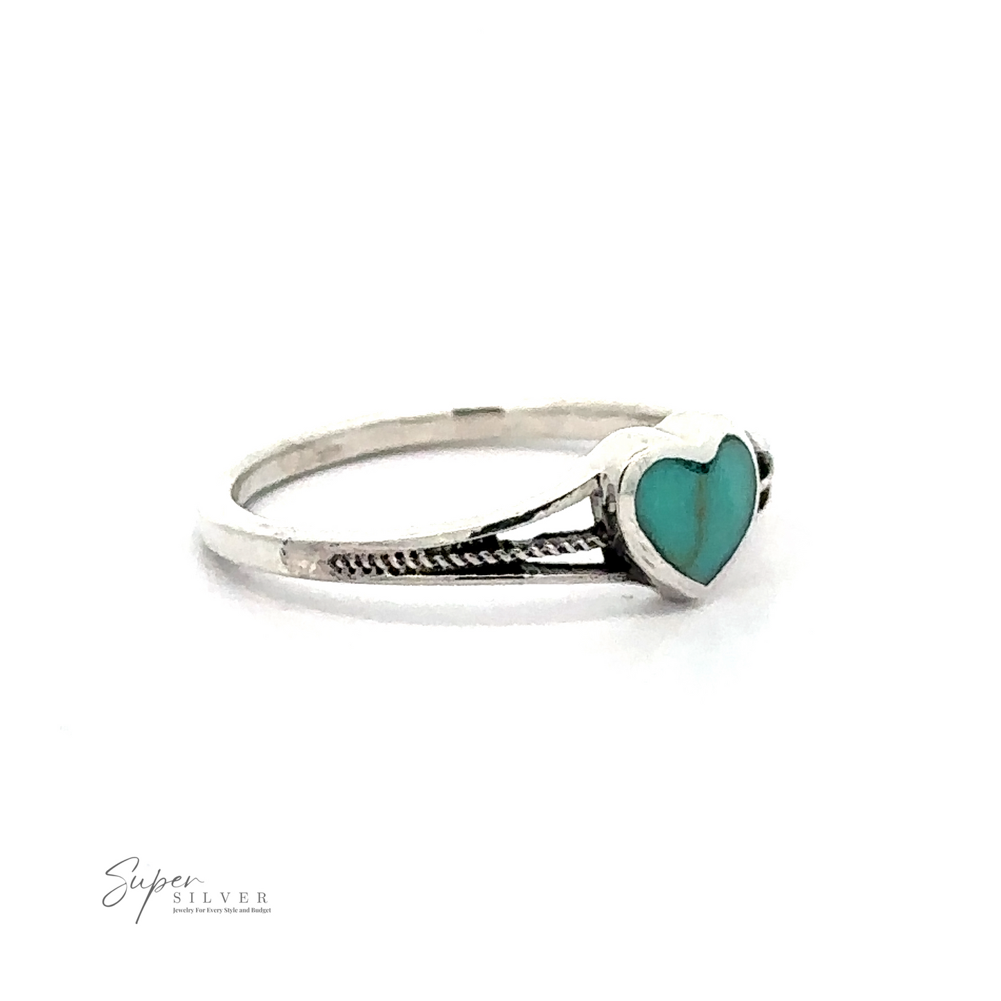 
                  
                    A Small Inlaid Turquoise Heart Ring featuring an adorable turquoise heart-shaped stone. The band includes a subtle, braided design. The image has the "Super Silver" logo in the bottom left corner.
                  
                