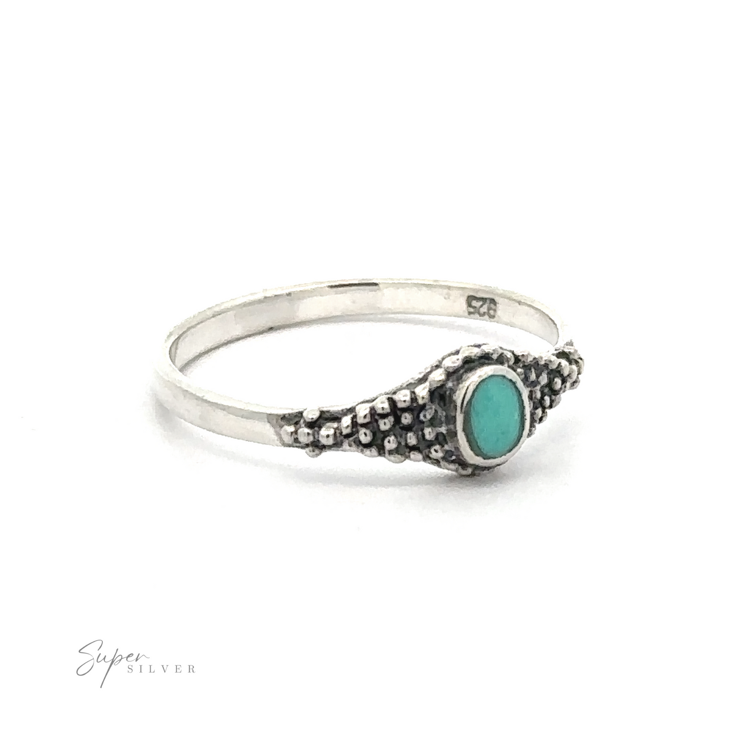 
                  
                    A Dainty Inlaid Ring with Beaded Texture with a turquoise stone and Bali-style beading.
                  
                