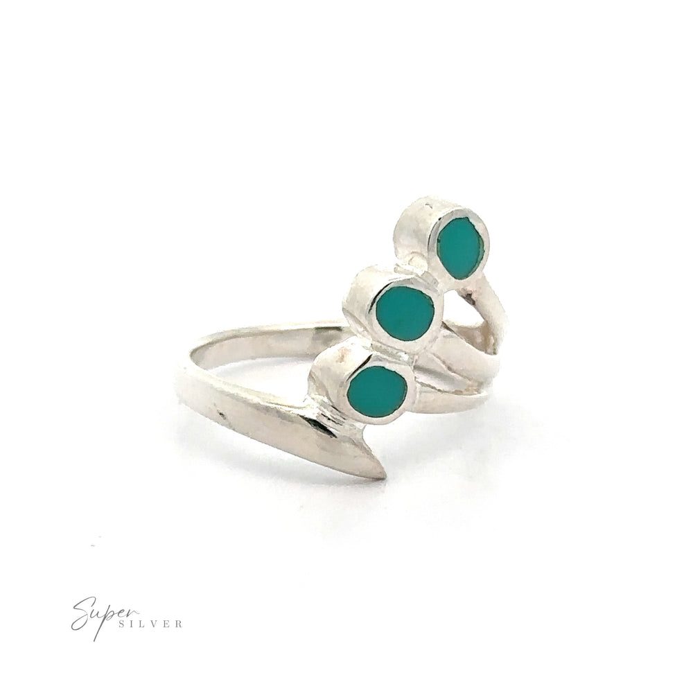 A Fanned Inlay Turquoise Ring with three reconstituted turquoise stones.