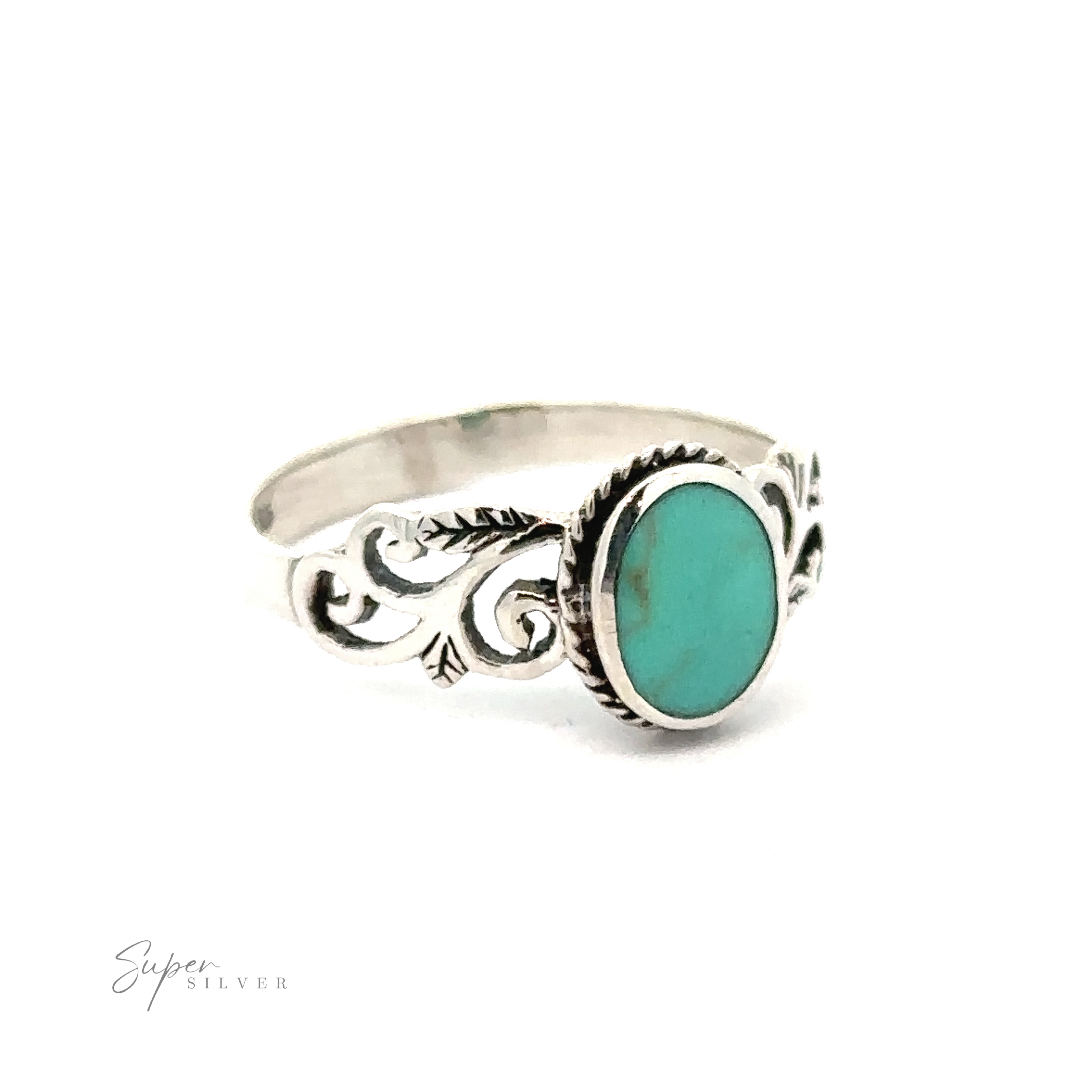 A Oval Inlaid Ring with Swirls and Leaf Detailing.