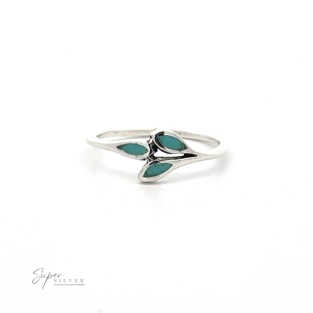 
                  
                    A Tiny Leaves Ring with Inlaid Stones crafted from sterling silver, featuring three green leaf-shaped inlays arranged in a triangular pattern. Text on the lower left corner reads "Super Silver.
                  
                