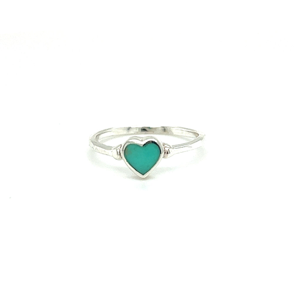 
                  
                    The Super Silver Dainty Inlaid Heart Ring features a heart shaped turquoise stone, creating a stunning centerpiece on a white background.
                  
                