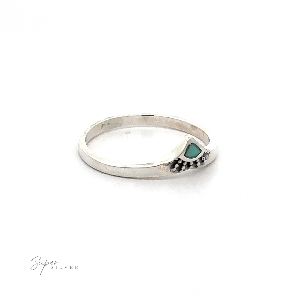 
                  
                    A Dainty Chevron Bali Style Inlay Ring with a turquoise stone.
                  
                