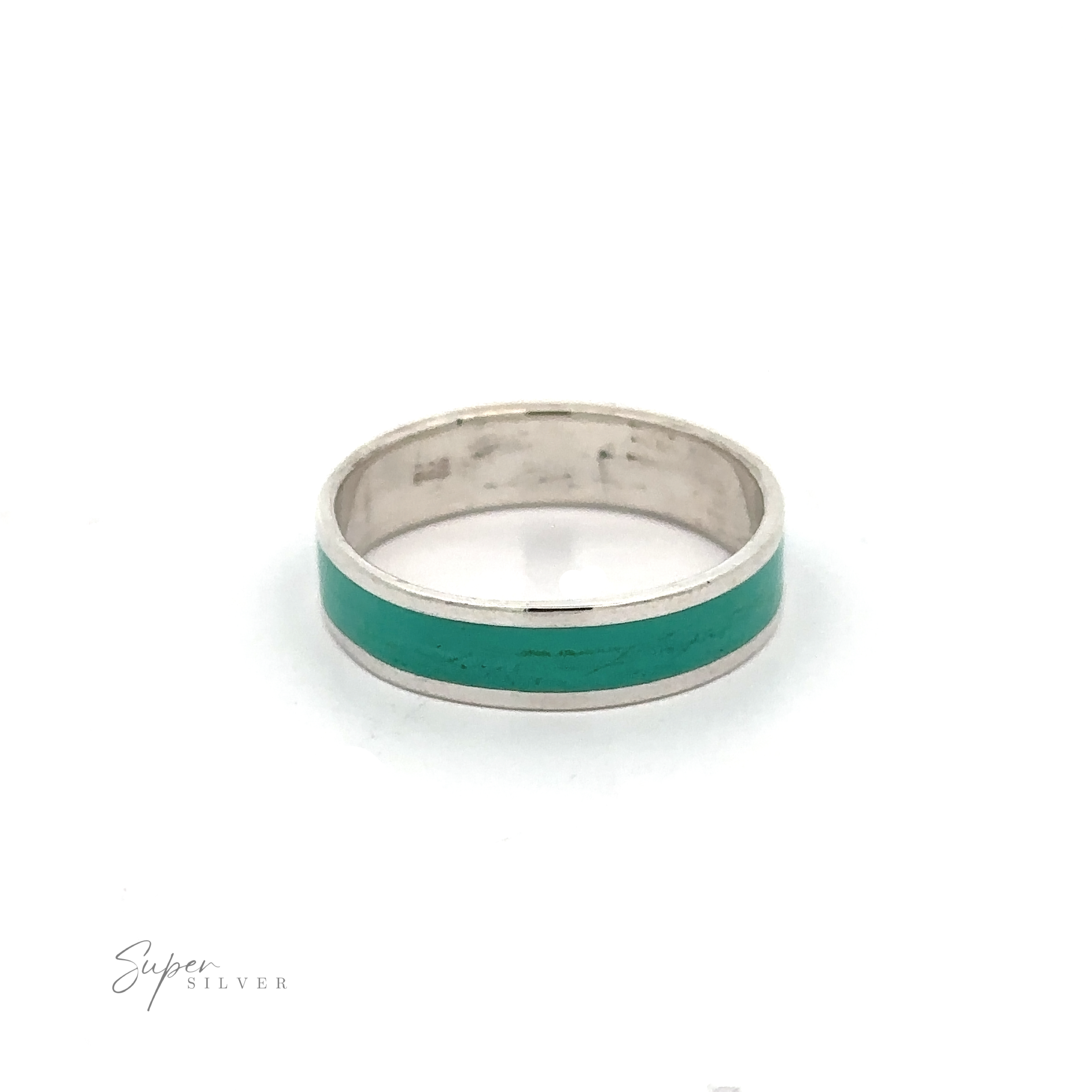 The Simple Inlay Band is a minimalist sterling silver ring with a green stripe encircling the center against a white backdrop.