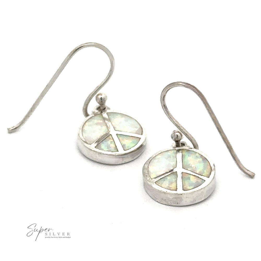 Pair of White Created Opal Round Peace Sign Earrings with iridescent inlays, featuring a hook clasp design on a plain white background. The image includes a 