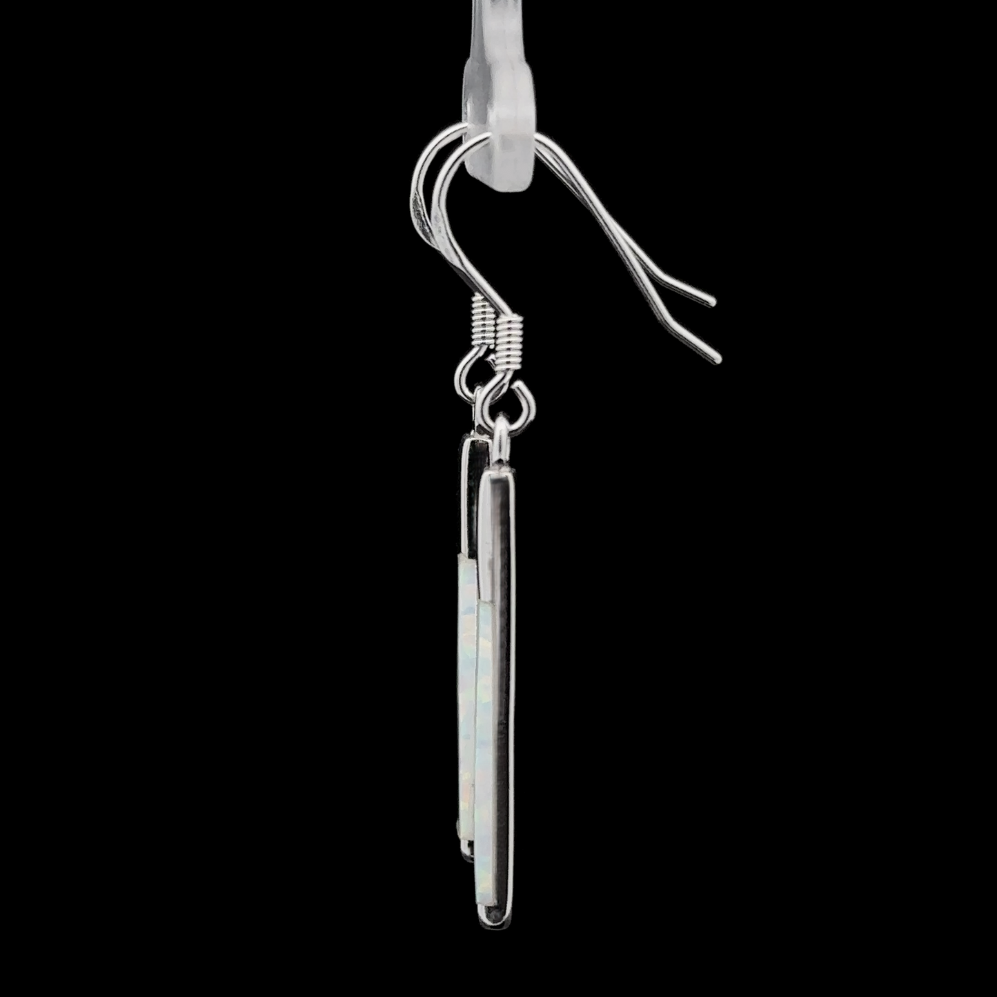 
                  
                    An Elegant Long Opal Earring, featuring a single silver drop with a thin, rectangular lab-created opal stone, hanging from a transparent hook against a black background—ideal for the contemporary artsy woman who appreciates modern flair.
                  
                