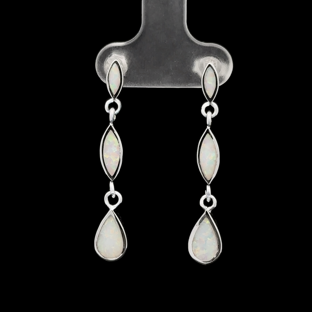 
                  
                    A pair of Elegant Lab-Created Opal Earrings featuring three marquise-cut lab-created opal stones and a teardrop opal stone, set in sterling silver and displayed on a black background.
                  
                