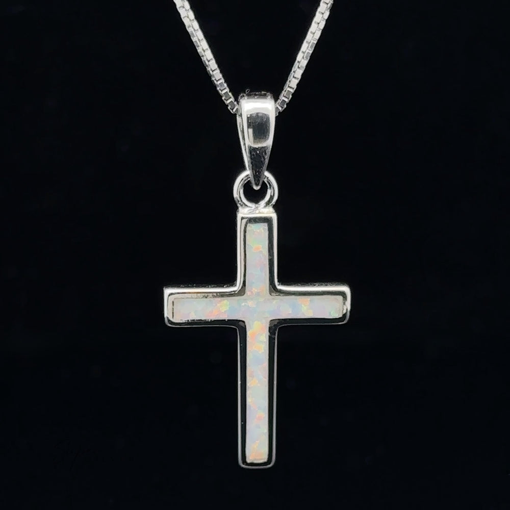 
                  
                    Lab-Created Opal Cross Pendants
                  
                