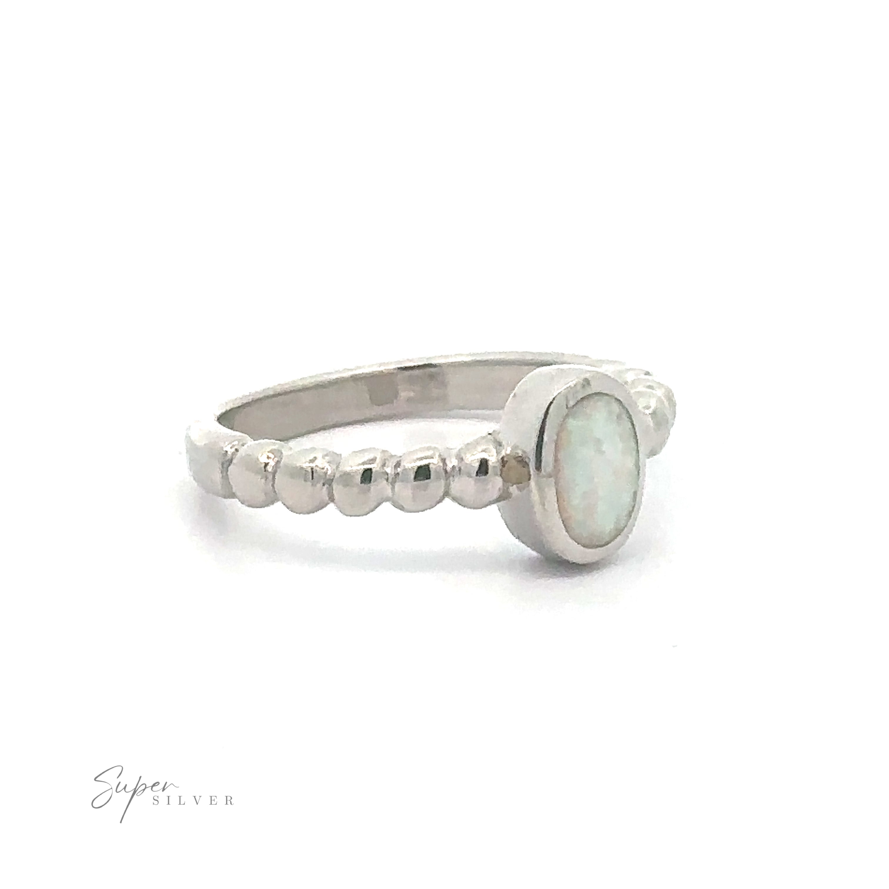 Oval Lab Opal with Beaded Band ring displayed against a white background.
