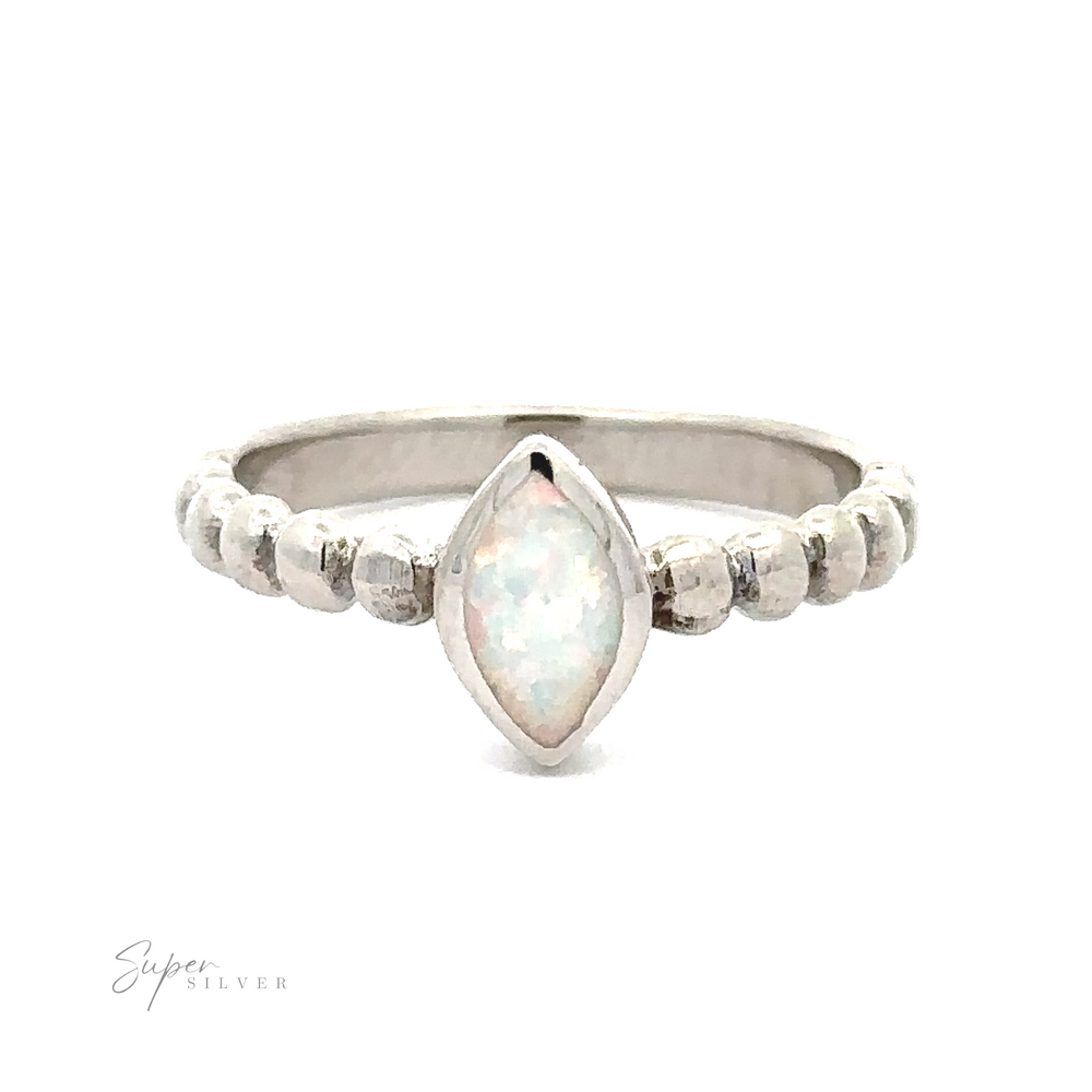 
                  
                    A silver Marquise Lab-Created Opal Ring with Beaded Design, isolated on a white background.
                  
                