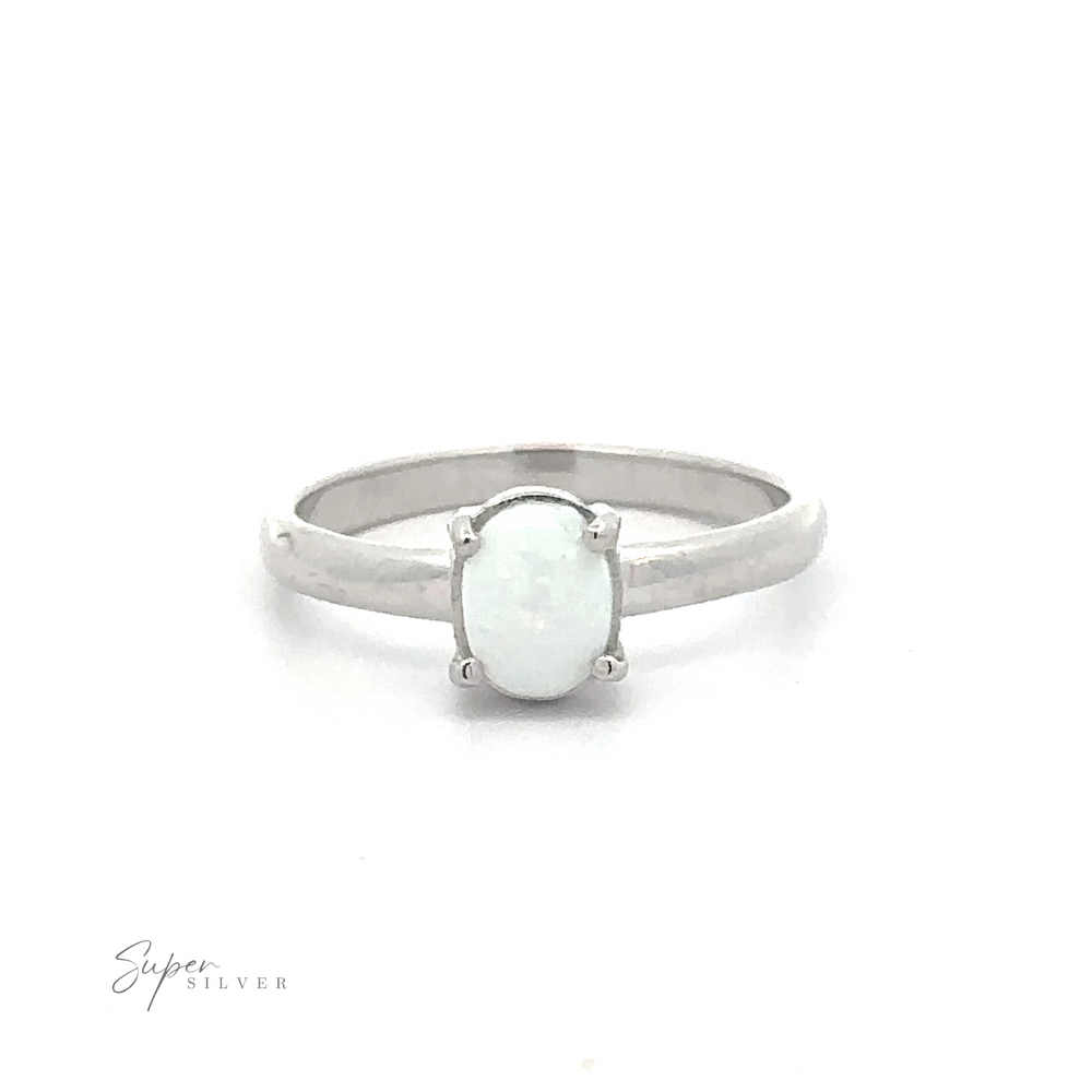 
                  
                    Simple Pronged Lab Opal Ring with an oval, lab-created opal set in a simple band.
                  
                