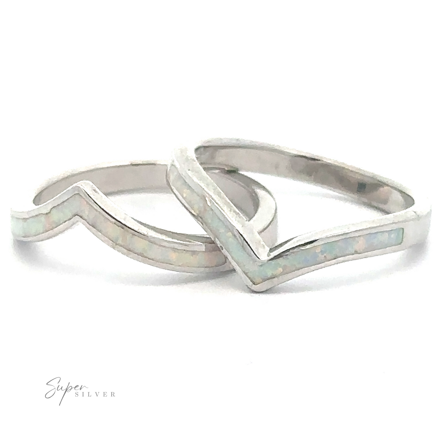 
                  
                    Pair of the Elegant Chevron Lab Opal Rings with a wave design and inlaid opal detailing, perfect for stacking.
                  
                