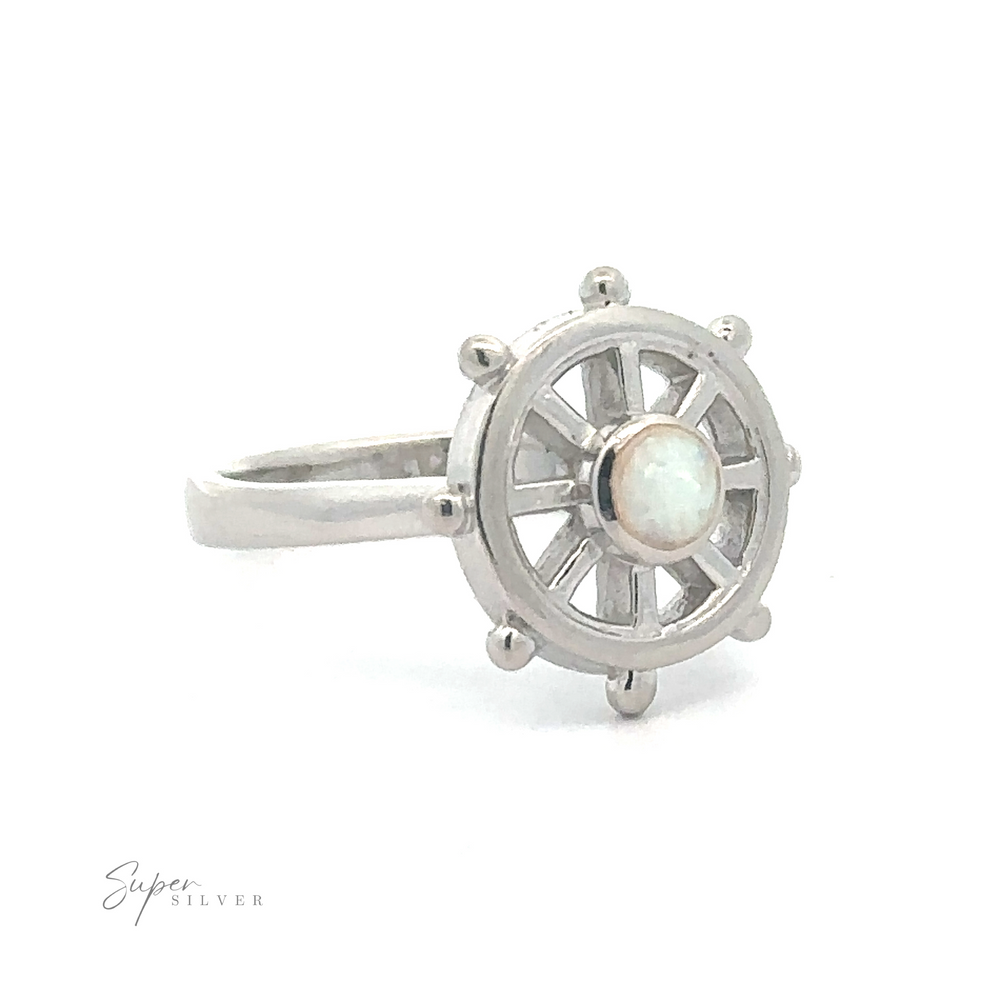 
                  
                    Ship Wheel Ring With Lab Opal with a central opal stone.
                  
                