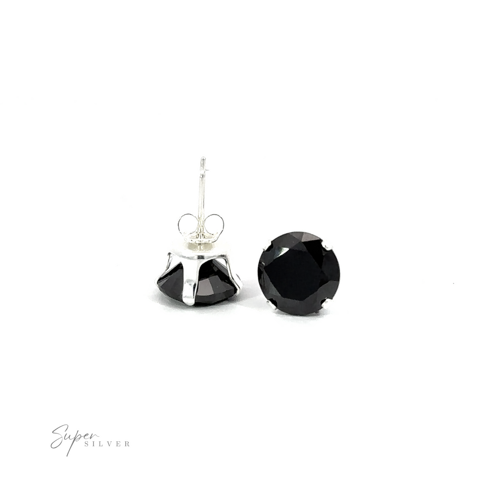 
                  
                    A pair of versatile black Round CZ Studs on a white background.
                  
                