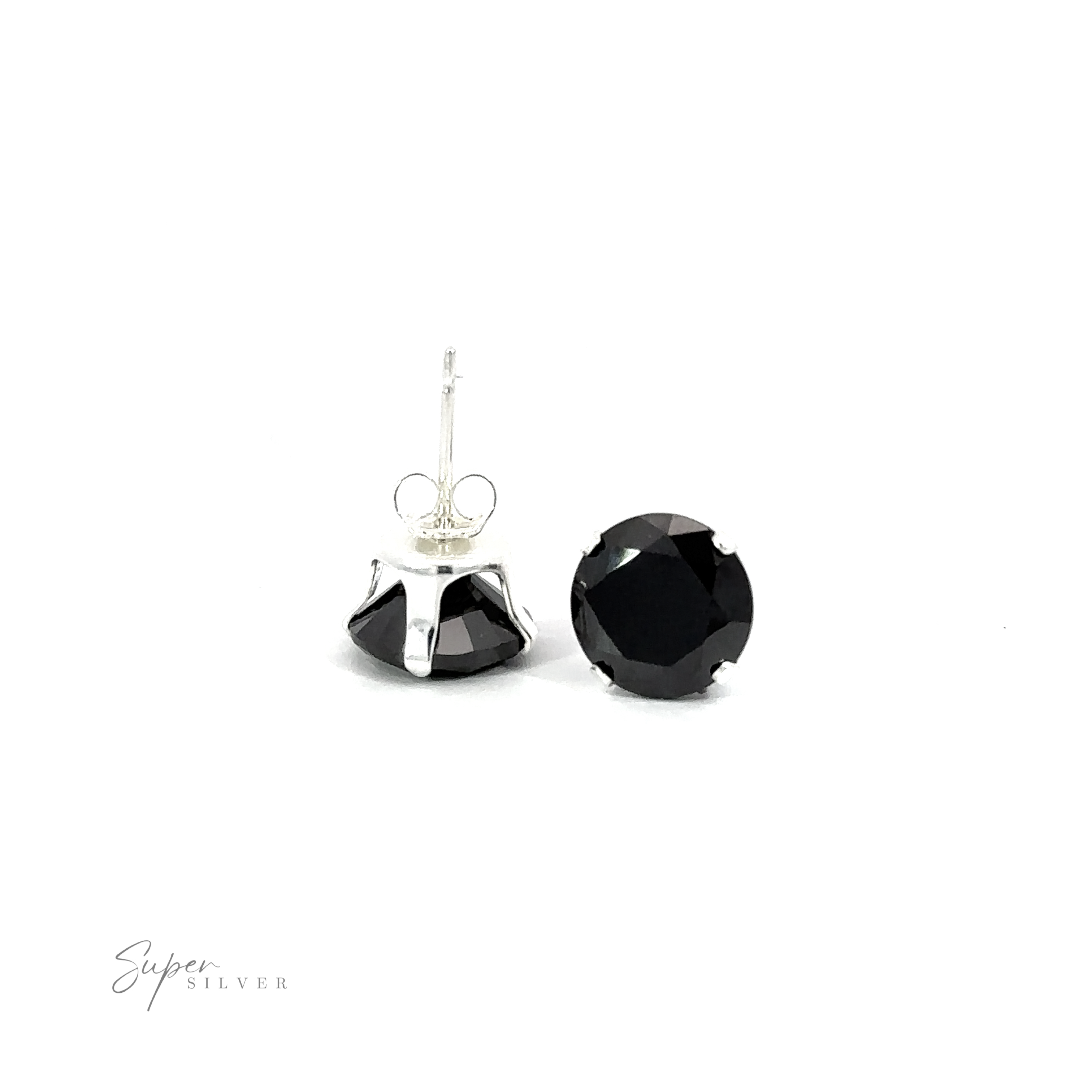 A pair of versatile black Round CZ Studs on a white background.