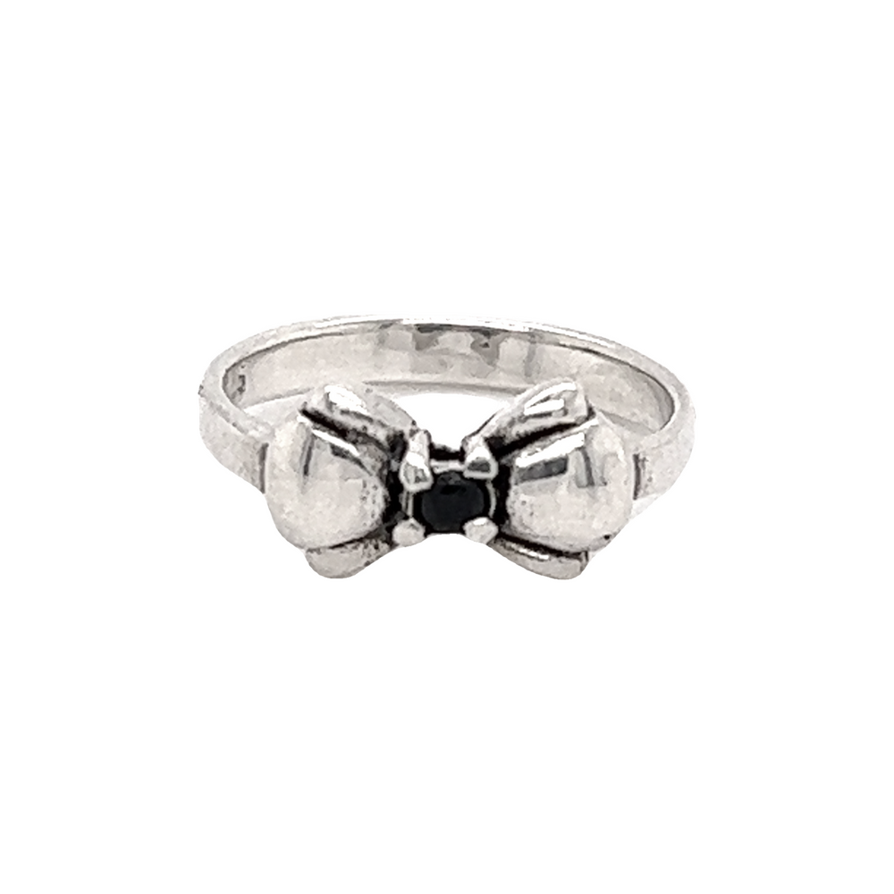 
                  
                    An Adorable Cubic Zirconia Bow Ring featuring a bow design with a small black cubic zirconia stone in the center.
                  
                