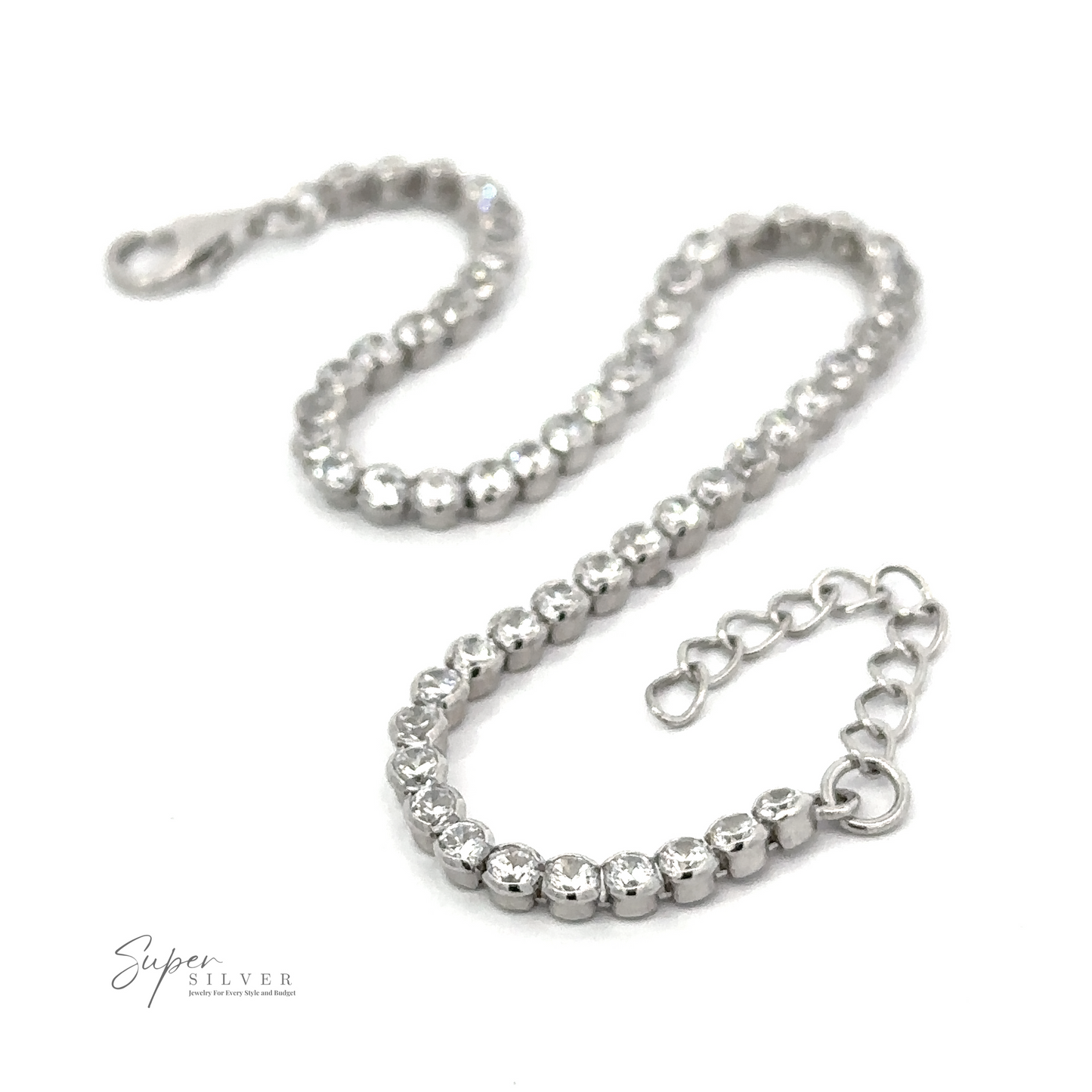 A Round Cubic Zirconia Tennis Bracelet with a clasp, featuring a series of linked, round beads and laid out flat on a white background. The logo "Super Silver" is visible in the bottom left corner. This dainty accessory adds an elegant touch to any outfit.