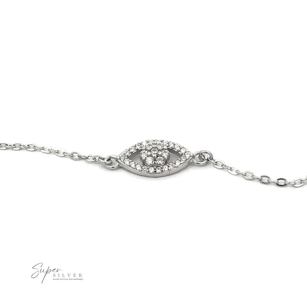 Dainty Cubic Zirconia Evil Eye Bracelet with an eye-shaped charm, embedded with small diamonds and crafted from Rhodium Plated .925 Sterling Silver, photographed against a white background. 'Super Silver' logo appears in the bottom-left corner.