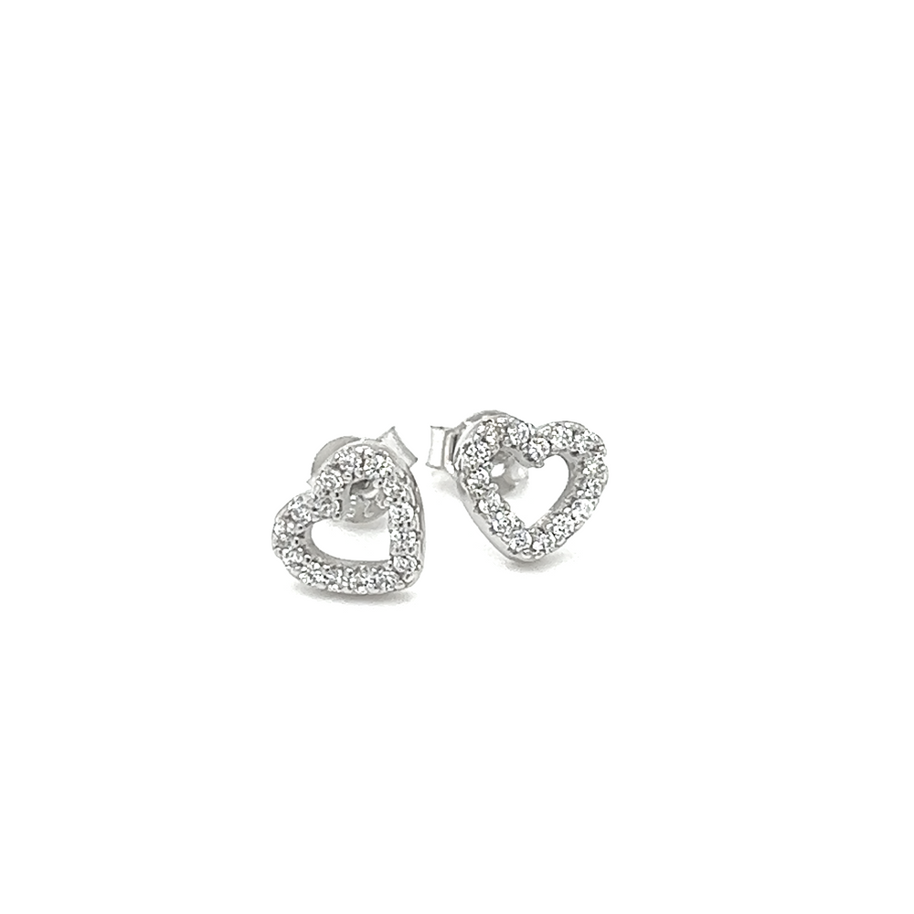 A pair of Heart Outline Cubic Zirconia Studs by Super Silver, featuring sparkling cubic zirconia stones set in .925 Sterling Silver, showcased against a white background.