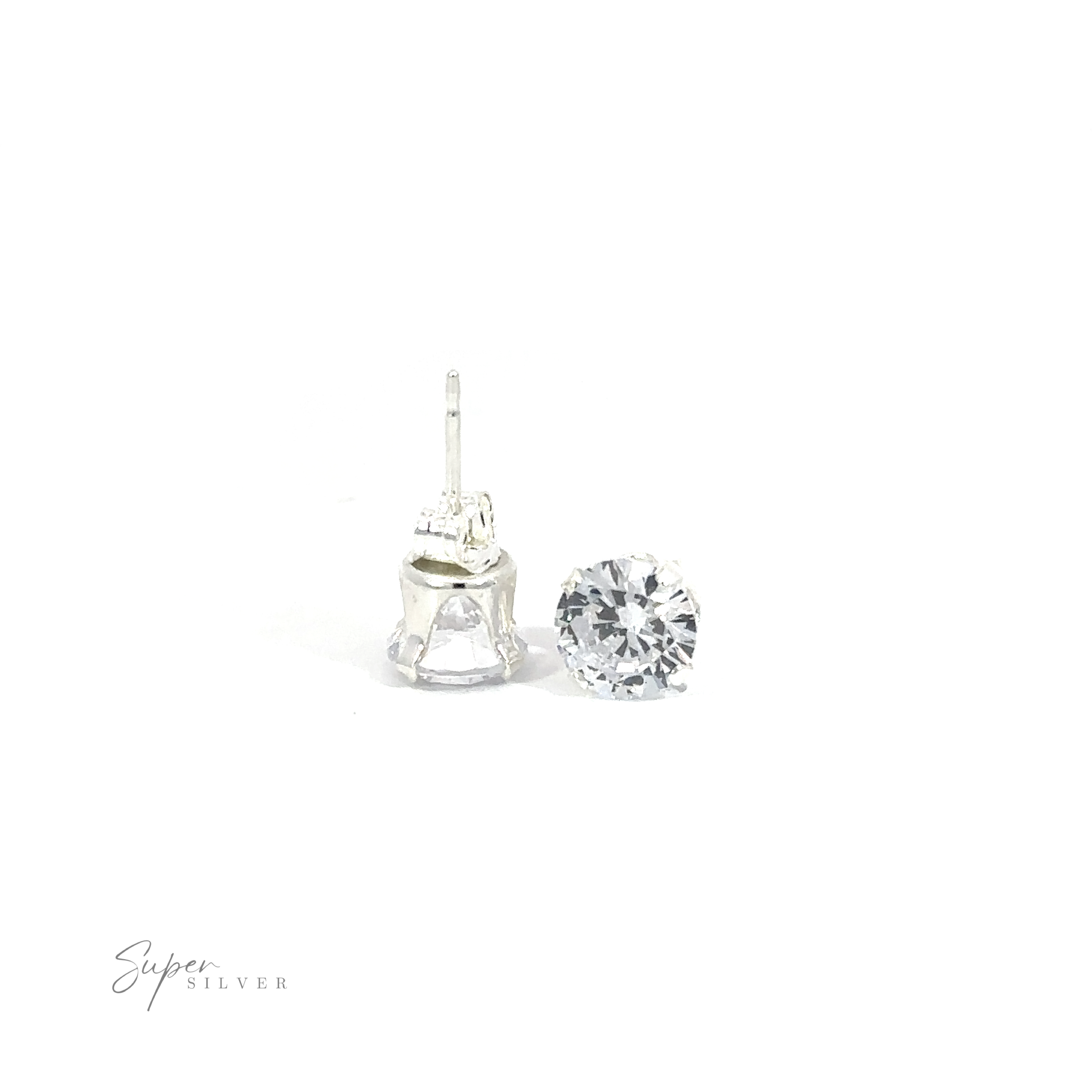 Round CZ Stud earring displayed next to a loose diamond on a white background.