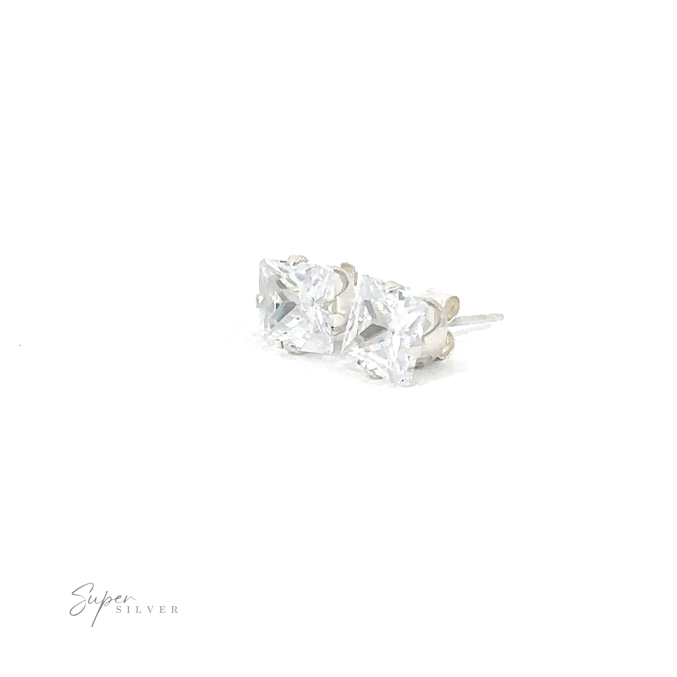 A pair of Square CZ Studs on a white surface.