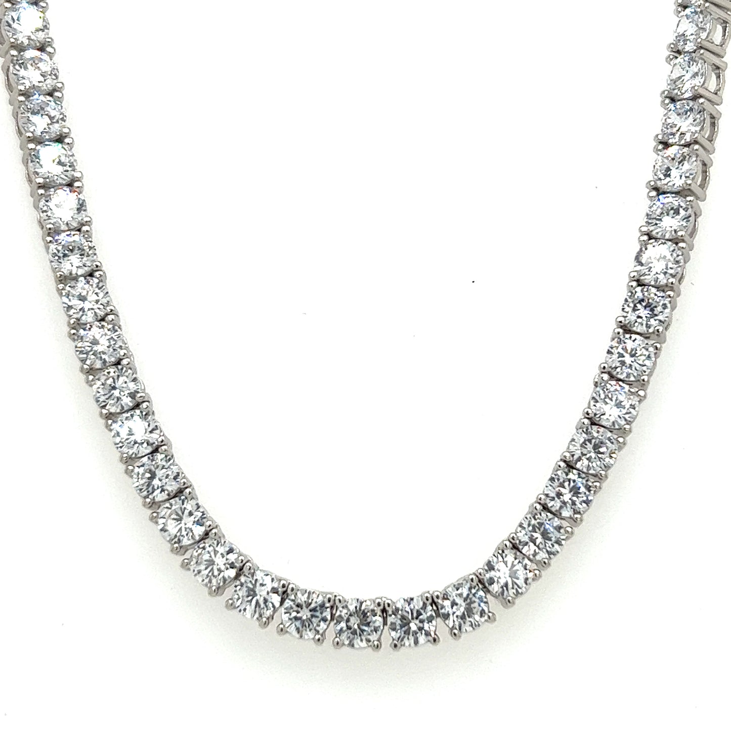
                  
                    A Super Silver cubic zirconia tennis necklace with diamonds.
                  
                