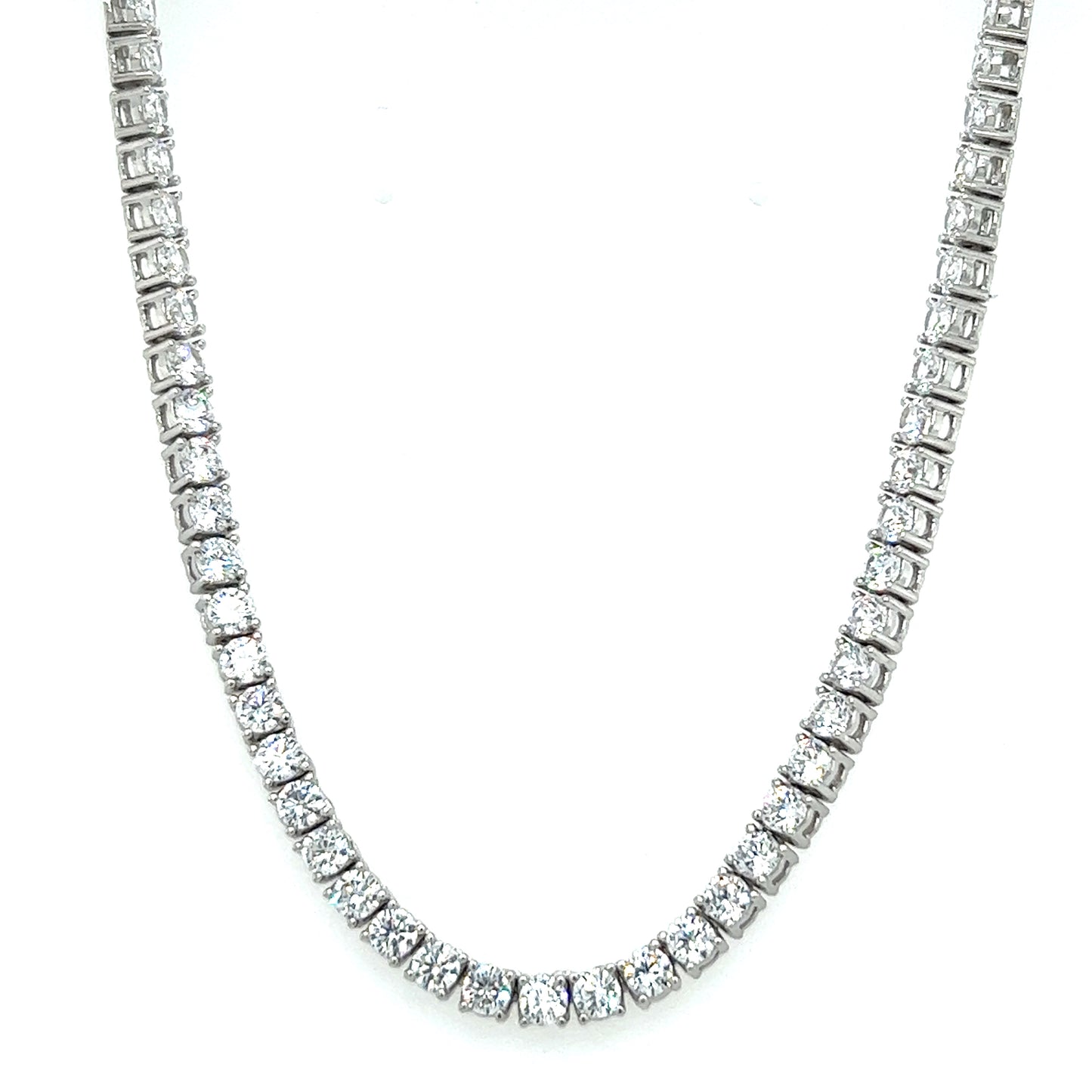 
                  
                    A Super Silver cubic zirconia tennis necklace with a rhodium finish on a white background.
                  
                