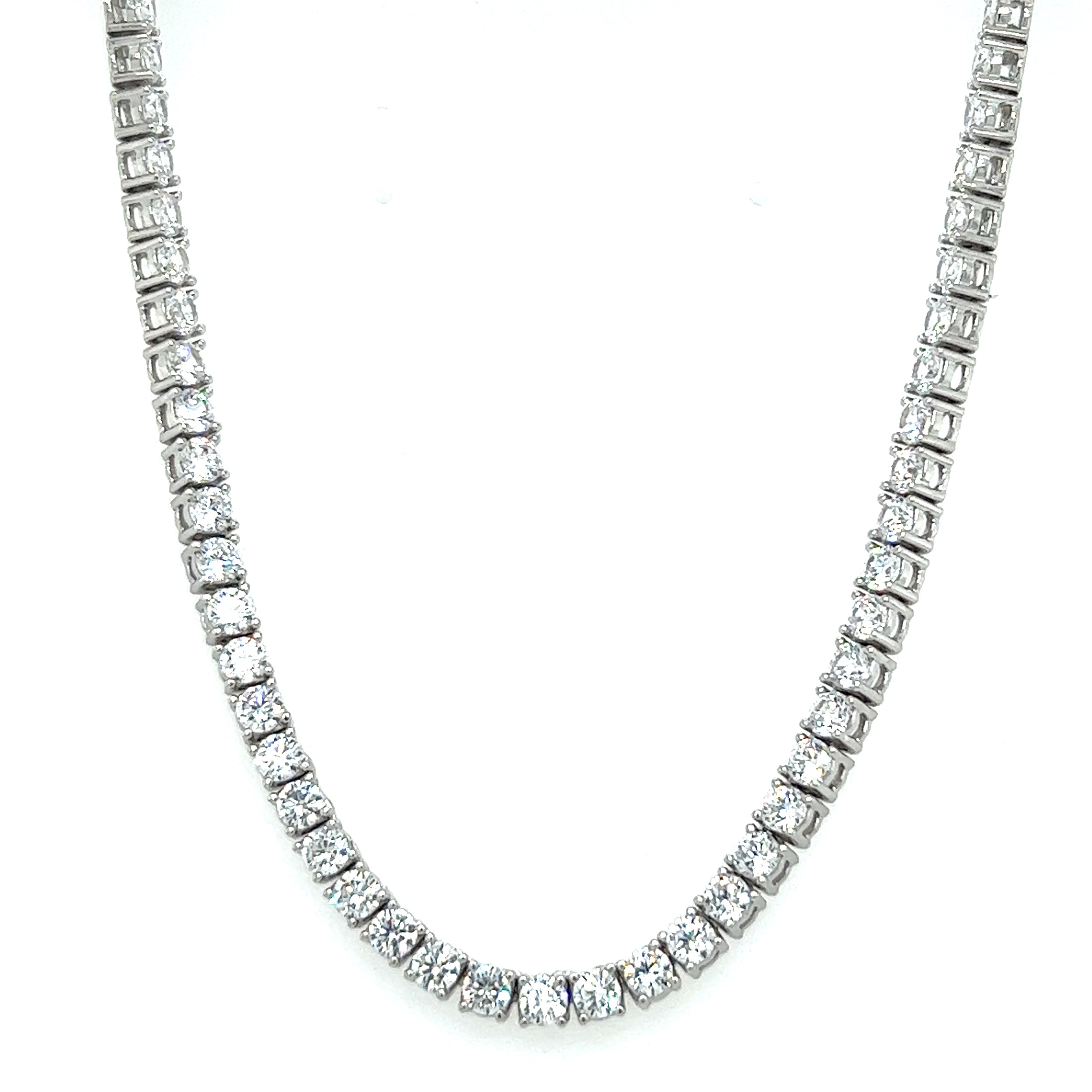 A Super Silver cubic zirconia tennis necklace with a rhodium finish on a white background.