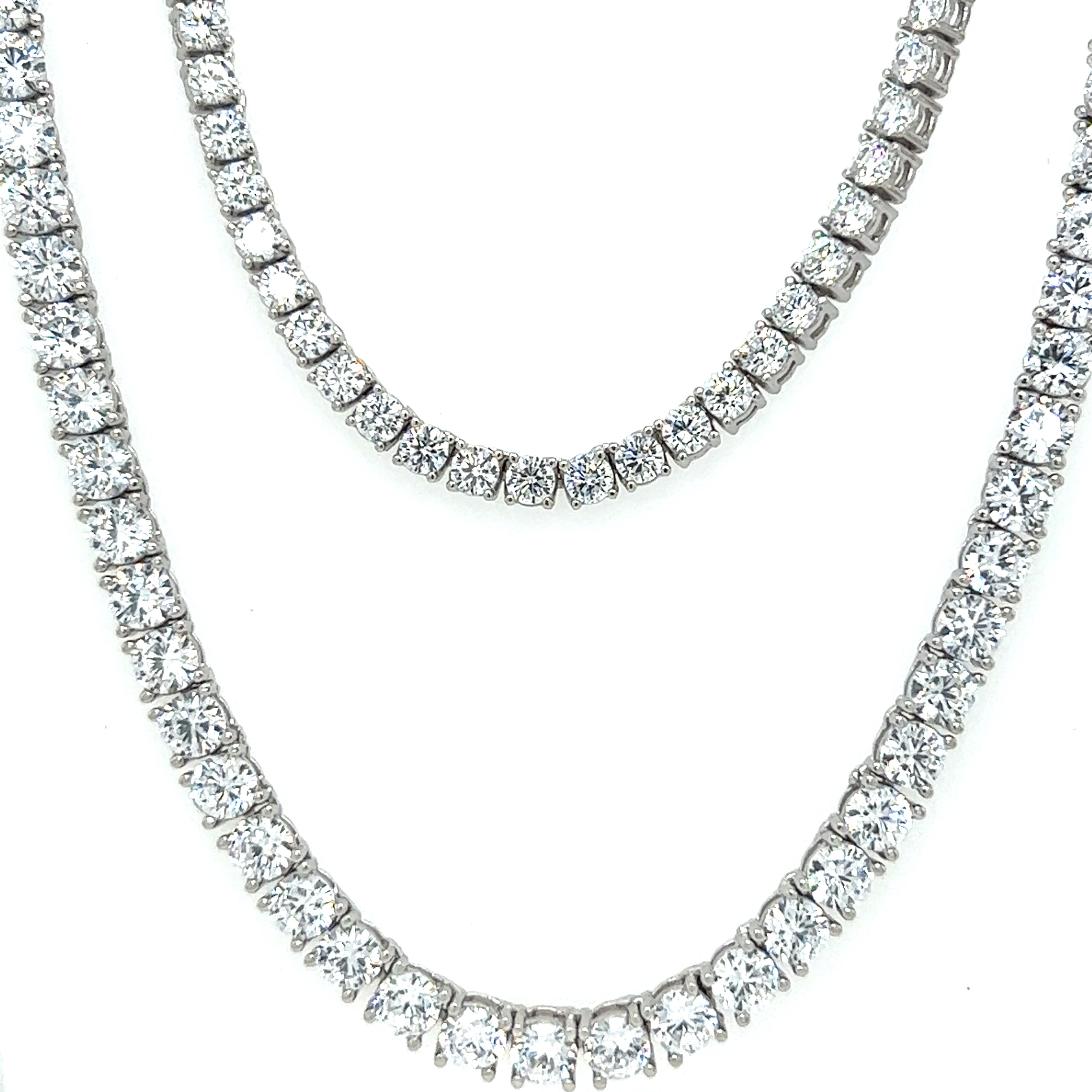 Two Super Silver Cubic Zirconia Tennis necklaces on a white background.