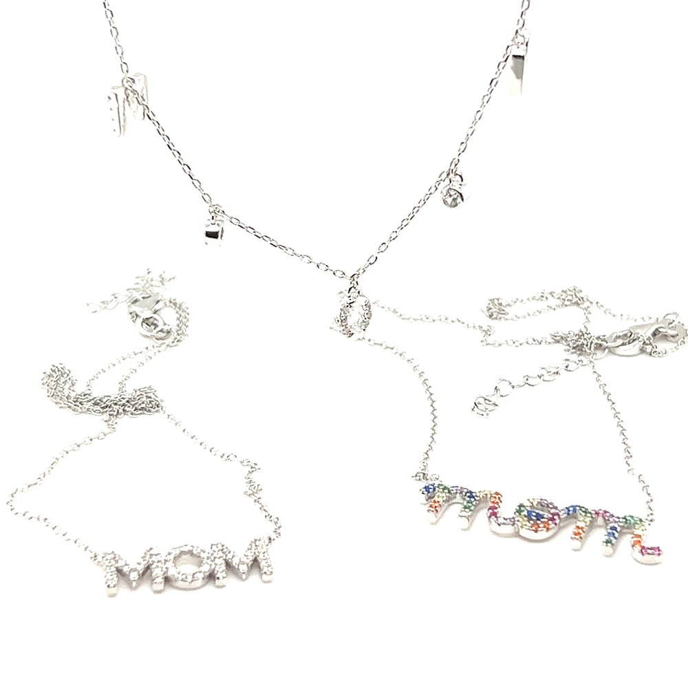 
                  
                    Three Super Silver Mom And Mama Necklaces adorned with cubic zirconia stones, perfect for moms.
                  
                