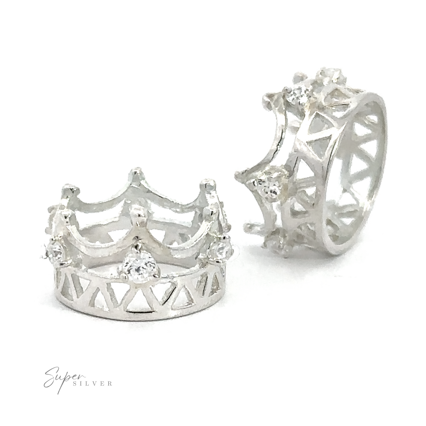 
                  
                    Two sterling silver crown-shaped rings with intricate designs and small cubic zirconia gemstones are displayed. The Cubic Zirconia Crown Pendant features openwork patterns and decorative elements. A small "Super Silver" logo is visible in the corner.
                  
                