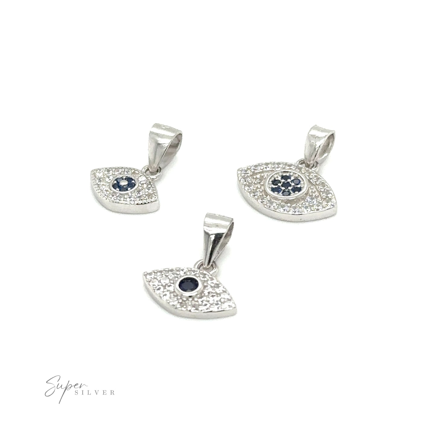 
                  
                    Three Evil Eye Pave Cubic Zirconia Charms adorned with diamonds and blue sapphires.
                  
                