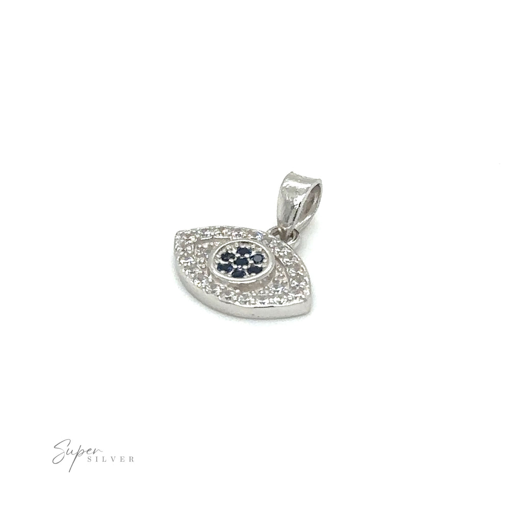 
                  
                    An Evil Eye Pave Cubic Zirconia Charms pendant adorned by diamonds, blue sapphires, and pave cubic zirconia.
                  
                