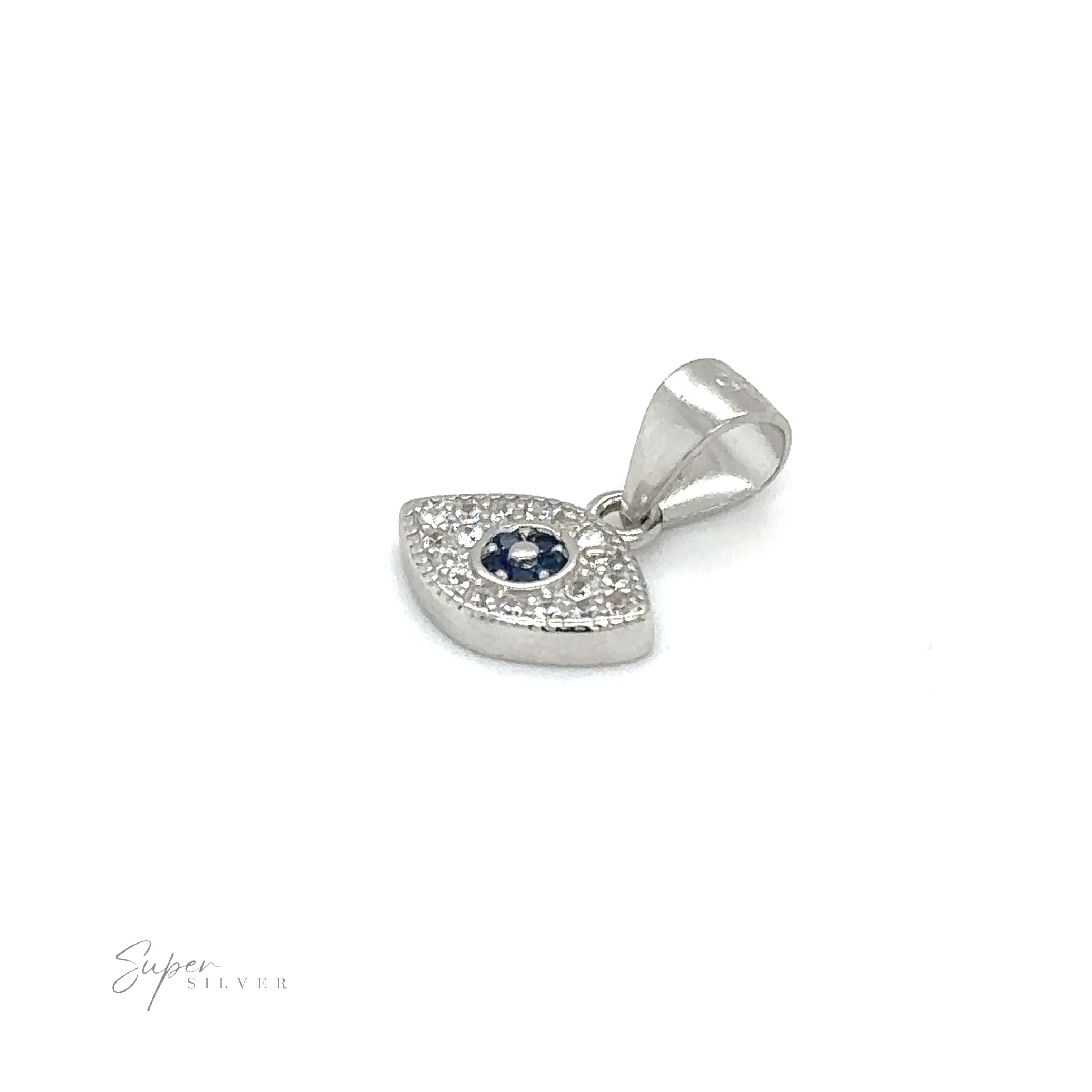 A stunning Evil Eye Pave Cubic Zirconia Charms adorned with sparkling diamonds and vibrant blue sapphires.