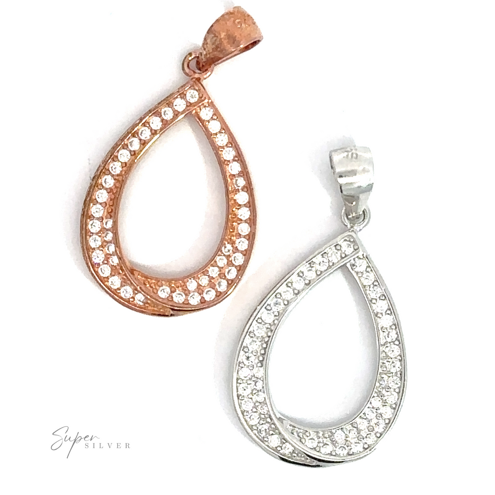 Two Teardrop Shape Cubic Zirconia Pendants, one in rose gold and the other in Sterling Silver, both adorned with small clear Cubic Zirconia crystals. 