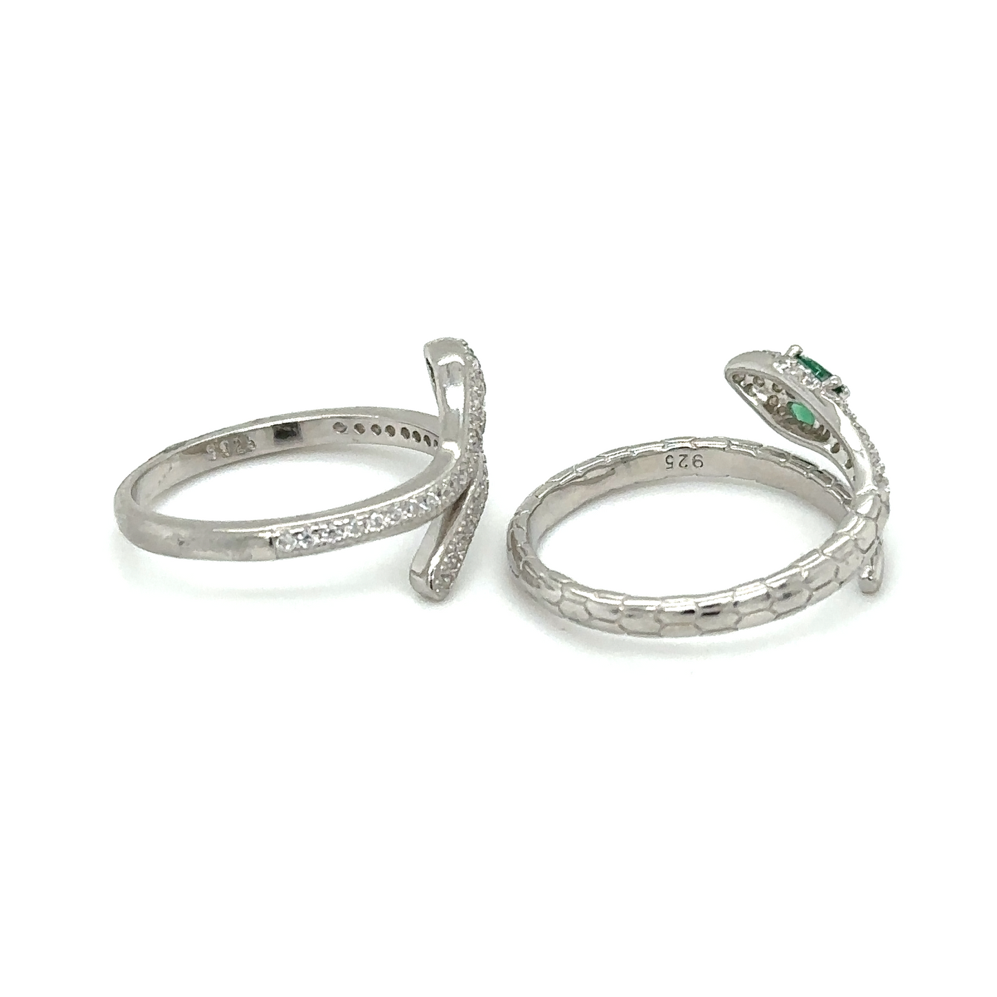 
                  
                    Two adjustable cubic zirconia snake rings on a white background.
                  
                