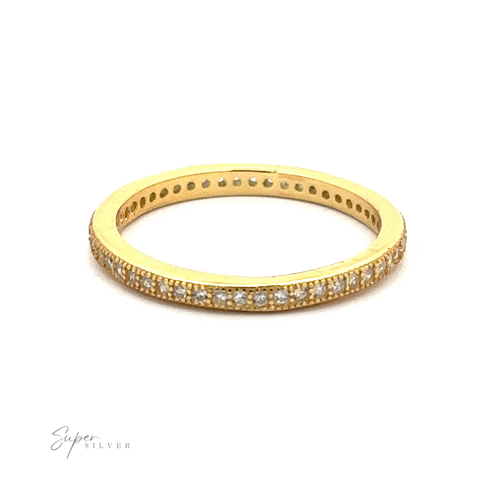 
                  
                    A Classic Pave Cubic Zirconia Eternity Ring with small diamonds embedded around the entire band. The words "Super Silver" appear in the bottom left corner.
                  
                