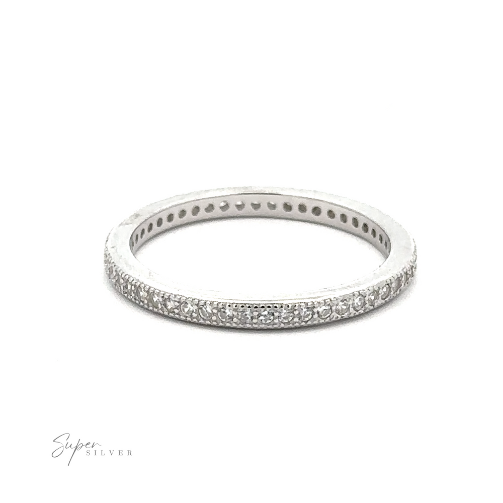 
                  
                    A Classic Pave Cubic Zirconia Eternity Ring with a row of small, sparkling cubic zirconia stones set into the band. The half-eternity ring is thin and has a clean, polished finish. The brand logo "Super Silver" is visible in the bottom left corner.
                  
                
