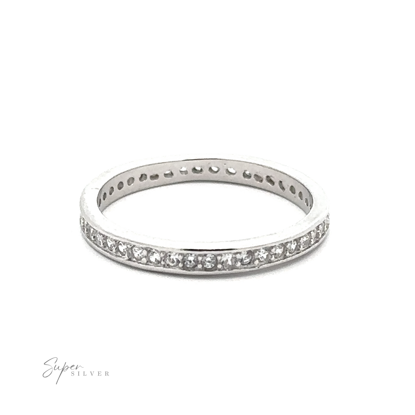 
                  
                    A *Classic Pave Cubic Zirconia Eternity Ring* crafted from .925 Sterling Silver, adorned with small, round cubic zirconia stones around its circumference, is positioned against a white background. The words "Super Silver" are written in the bottom left corner.
                  
                