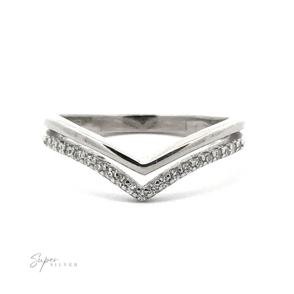 
                  
                    A modern double chevron, sterling silver ring with a V-shaped design features a band of small diamonds on the top. The words "Double Chevron Cubic Zirconia Ring" are visible in the bottom left corner.
                  
                