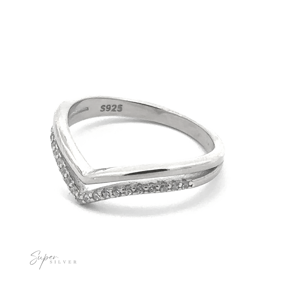 
                  
                    This Double Chevron Cubic Zirconia Ring features a modern double chevron design adorned with small cubic zirconia gemstones, marked with "S925" inside the band.
                  
                