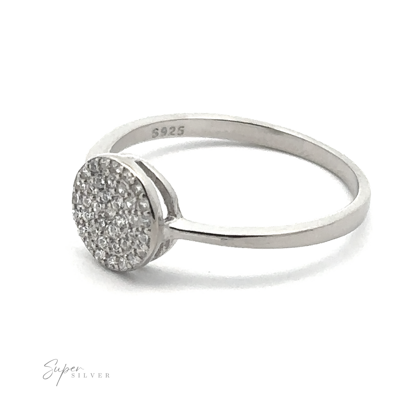 
                  
                    The Round Pave Cubic Zirconia Ring is a sterling silver piece featuring a circular head encrusted with small cubic zirconia stones and stamped with "S925." Set against a plain white background, the image accentuates the ring's intricate design. This exquisite ring boasts a rhodium finish that enhances its brilliance and durability.
                  
                