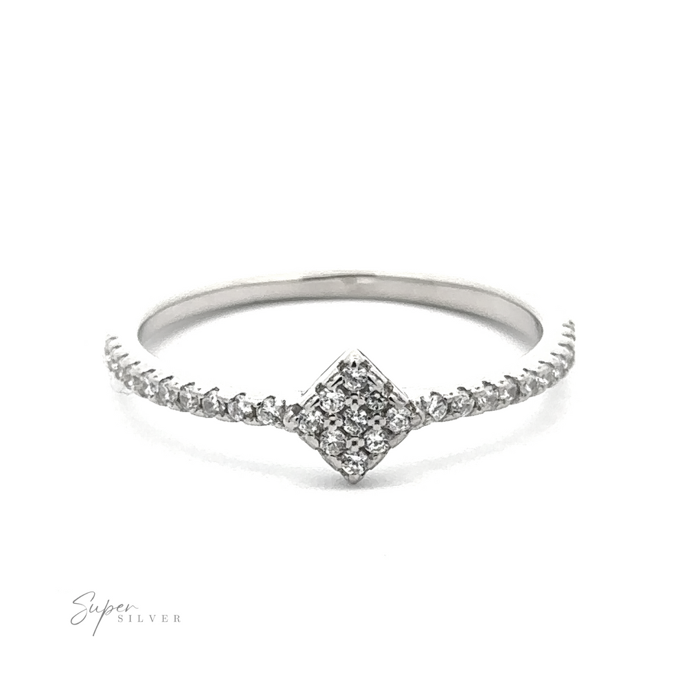 A Tiny Pave Cubic Zirconia Diamond-Shaped Ring featuring a diamond-shaped cluster of small diamonds in the center and a band adorned with additional diamonds, crafted from high-quality 925 sterling silver. The image features 