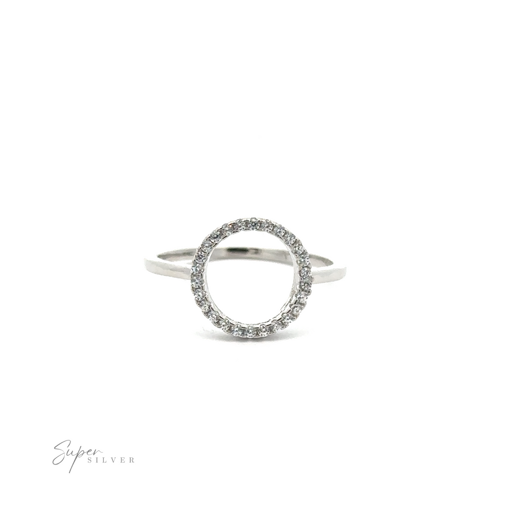 
                  
                    The Modern Circular Pave Cubic Zirconia Ring, showcased on a plain white background, radiates modern elegance with its sterling silver open design encrusted with small crystals.
                  
                